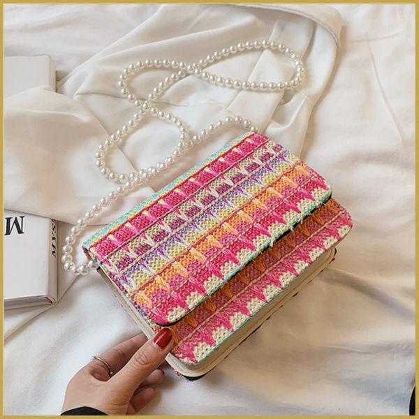 Bohemian slingbag with stylish rainbow prints.