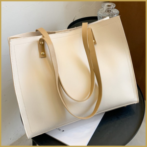 Tote-style elegant handbag for office use.