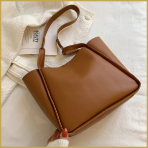 Affordable leather tote bag with minimalist design and spacious interior.